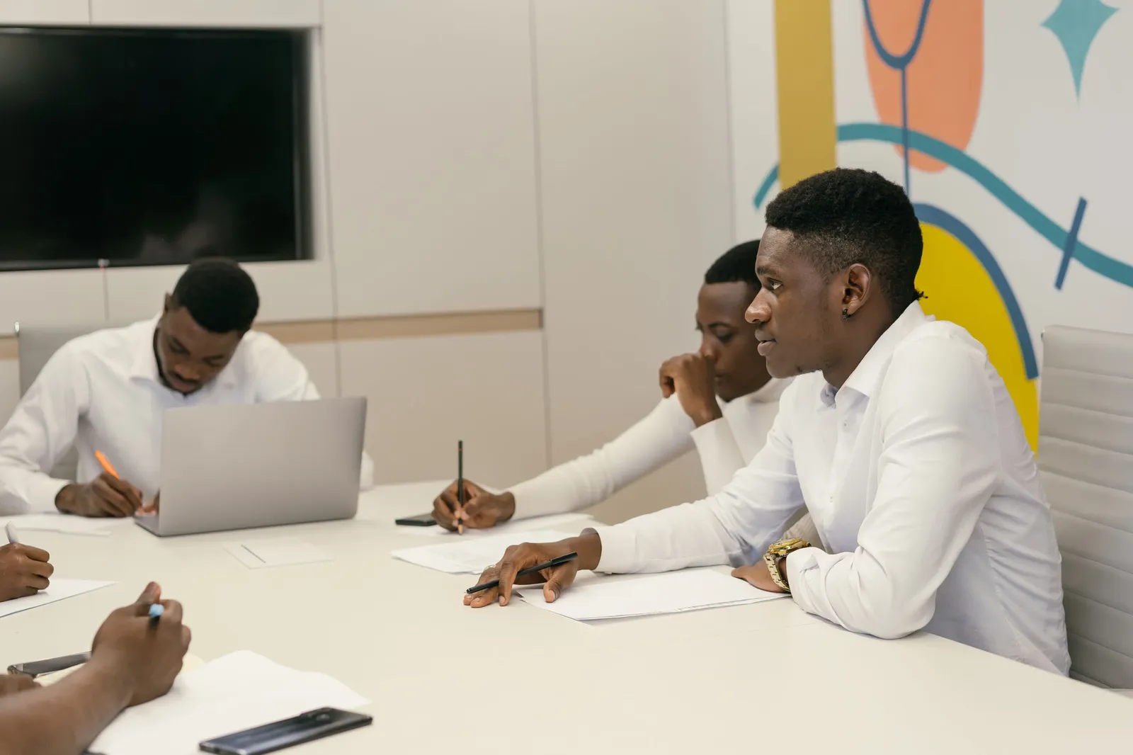Odoo developer training session with engineers collaborating on module development